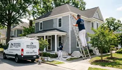 Professional house painters in Lynchburg VA finishing exterior home painting project