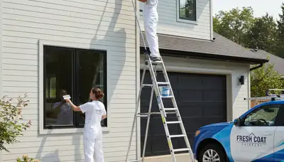 Professional siding painting on Lynchburg VA home by expert local house painters